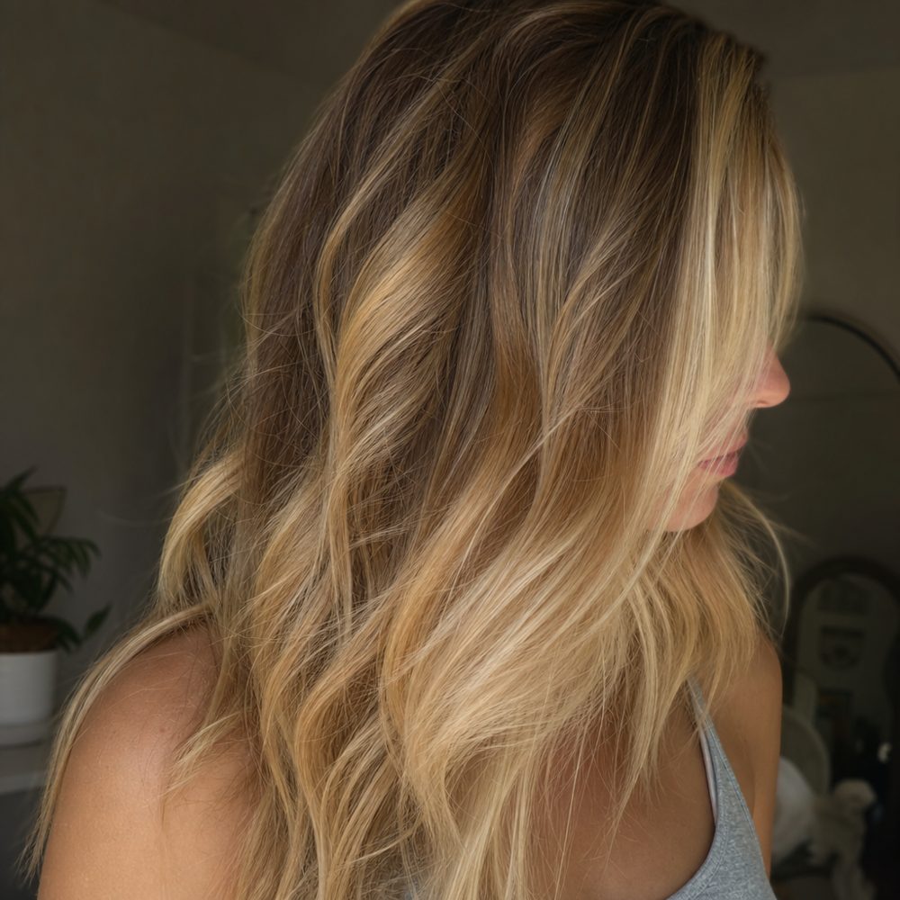 Dimensional balayage with soft golden ends